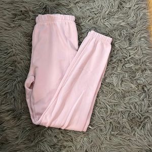 light pink aritzia TNA cozy fleece sweatpants
